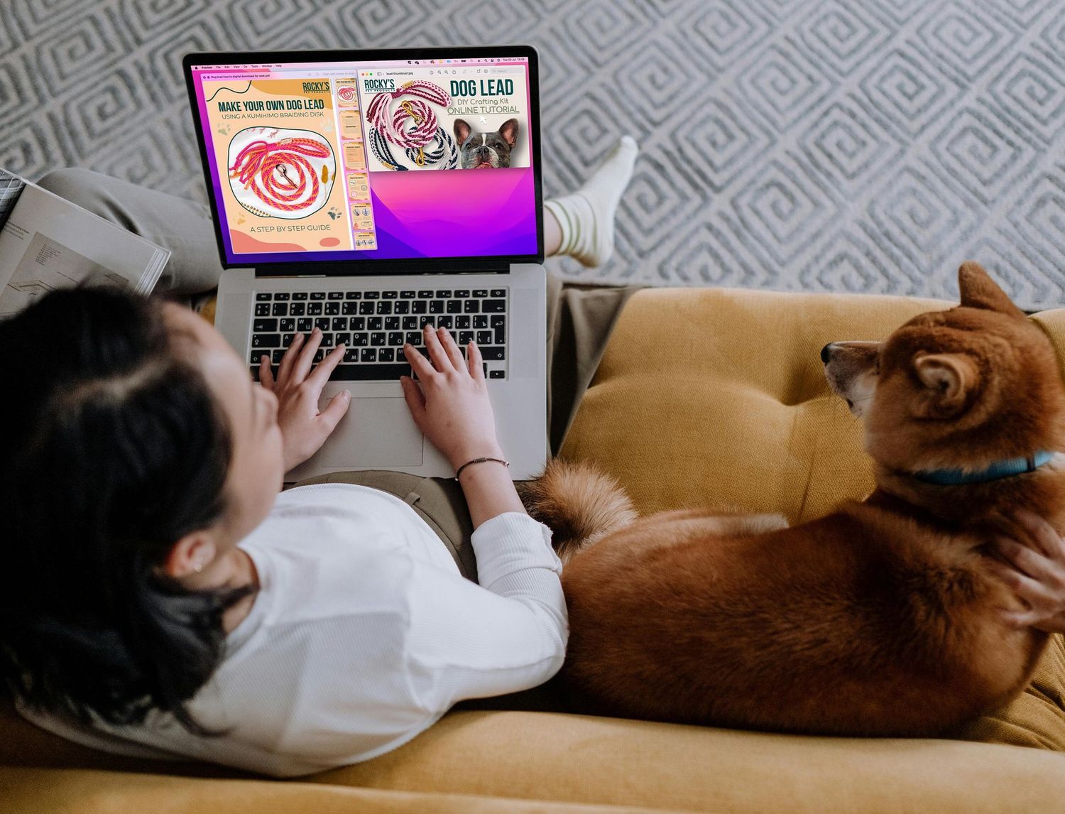 Macrame Make Your Own Dog Lead Crafting Download Guide on a Laptop Screen on a lady's lap on sofa, sitting next to a dog
